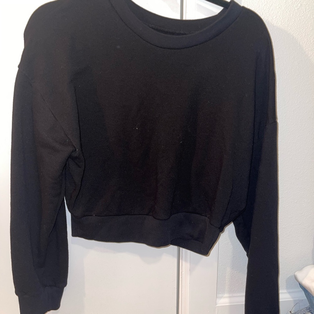 Black reformation sweater. Size small